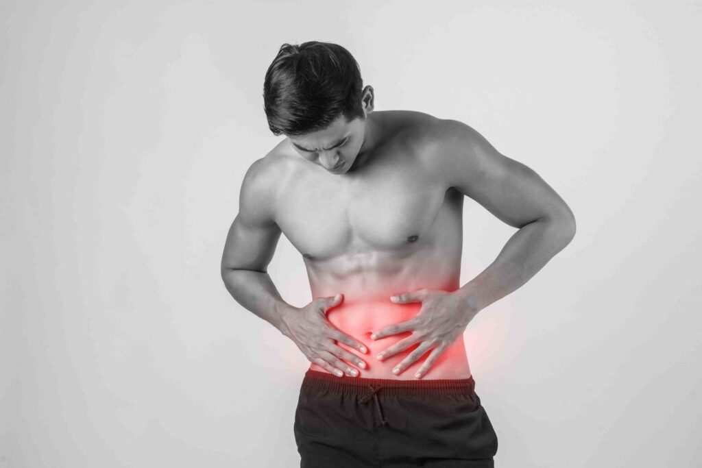 young-handsome-muscular-man-has-abdominal-pain-isolated-white-background-compressed